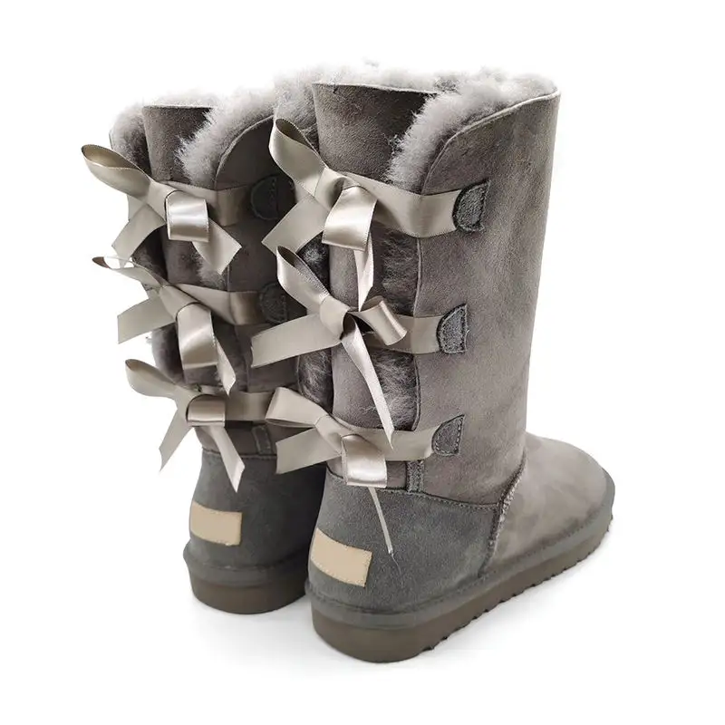 Fábrica al por mayor Personalización Nueva suela gruesa Impermeable Nieve Lana Botines Bowknot botas de nieve