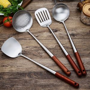 Juego de espátulas de acero inoxidable, 4 piezas, mango de madera, herramientas de cocina resistentes al calor para uso doméstico en la cocina - Product Image 1