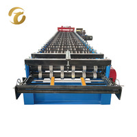 Machine de formage à froid de profilés de plancher en acier de Chine, haute vitesse, automatique, avec cisaillement hydraulique pour système de plancher de bâtiment en acier