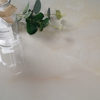 Carrelage de sol en marbre crème 24x48 en porcelaine émaillée polie de luxe pour le salon de la maison