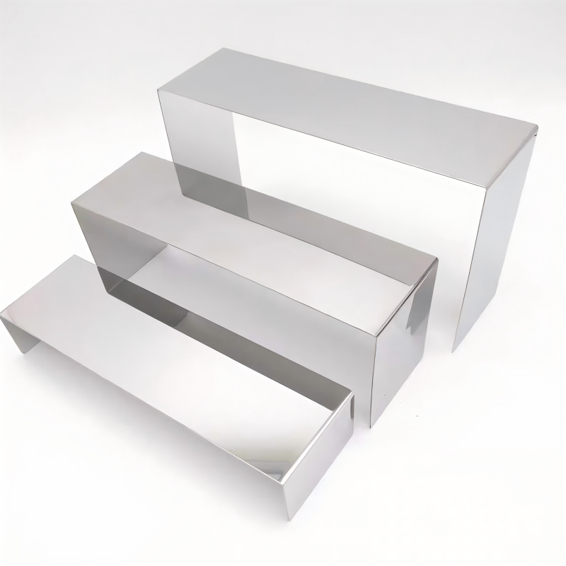 Ensemble trois pièces argenté effet miroir.