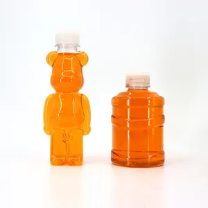 Botella de jugo con forma de oso única, botella de agua potable fría, botella de bebida energética deportiva de plástico PET con asa, 500ml, 700ml