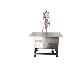 Machine automatique de remplissage et de scellage d'aérosols pour gaz liquide (butane, propane) et parfums en spray - Product Image 1