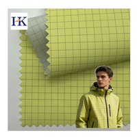 Chaqueta de Exterior 15D 100% Nailon con Revestimiento de PU, Tejido Tres en Uno a Cuadros, Suave, Impermeable y Transpirable