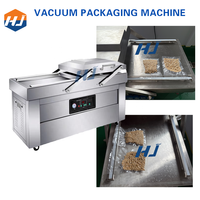 Machine d'emballage sous vide automatique à double chambre HJ pour l'emballage de tofu/tofu séché/boeuf/pommes de terre/viande/bacon/saucisses/sandwichs