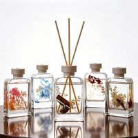 Vente en gros de flacons diffuseurs d'arômes en verre plat carré de 200 ml, imprimés à l'écran, transparents, portables, pour l'emballage d'aromathérapie