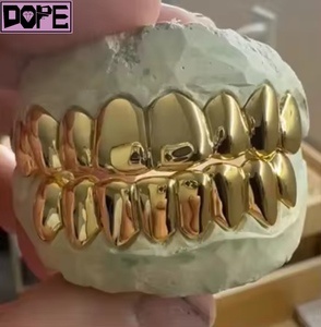 Grilles dentaires personnalisées en or plaqué 10k 14k 18k et argent sterling 925, style hip-hop rock, avec pierres incrustées, coupe permanente - Product Image 1