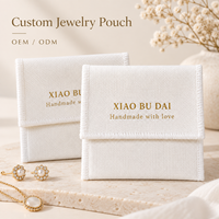 Pochette à bijoux en coton blanc avec logo personnalisé OEM ODM, petite pochette pour bijoux avec logo estampé à chaud en or pour l'emballage des bagues