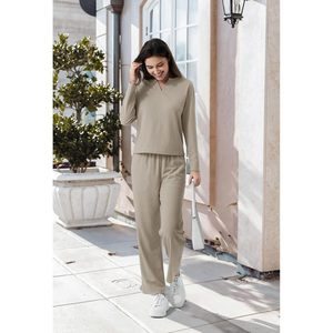 ชุดนอนผ้าวาฟเฟิลโมดอลสำหรับผู้หญิง เสื้อแขนยาวพร้อมกางเกงขายาว เนื้อผ้านุ่มสบาย มีกระเป๋า ระบายอากาศได้ดี ใส่ได้ทุกฤดู สไตล์ลำลอง - Product Image 2