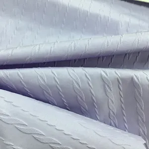 Tela pongee de poliéster 400T patrones en relieve 3D admite Personalización de fábrica para chaqueta de invierno