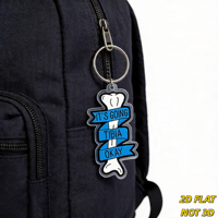 Porte-clés « It's Going Tibia Okay Bone » avec jeu de mots amusant sur l'anatomie et ruban bleu, breloque en acrylique découpée pour clés ou sac