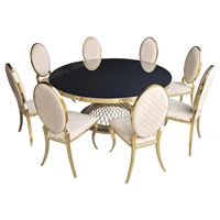Table de bar ronde avec plateau en verre noir et base en grille en acier inoxydable doré