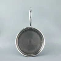 Cuisinière à induction personnalisée en acier inoxydable 304 avec revêtement en nid d'abeille antiadhésif et poêle à gaz en métal compatible