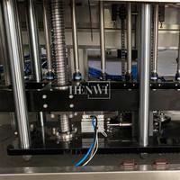 Henwi 12 Düsen Automatische beheizte Füll maschine für Wachs, Balsam, Honig und hochviskose Creme mit konstanter Temperatur.