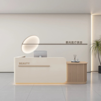 Meilleure vente : Bureau de réception moderne en forme de L pour infirmières, salons de coiffure, salles de sport, en bois de luxe avec éclairage LED
