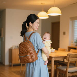 Fabricant personnalisé élégant matelassé végétalien en cuir PU maman bébé couche sac à couches sac à dos organisateur avec poches isolées - Product Image 3