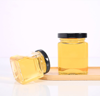 Pot à miel en verre transparent de qualité alimentaire de forme carrée classique avec couvercle à vis en fer blanc