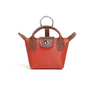 Nouveau <span class=keywords><strong>porte</strong></span>-<span class=keywords><strong>monnaie</strong></span> en forme <span class=keywords><strong>de</strong></span> boulette avec lanières <span class=keywords><strong>de</strong></span> bracelet pochette <span class=keywords><strong>porte</strong></span>-<span class=keywords><strong>monnaie</strong></span> en cuir PU avec <span class=keywords><strong>porte</strong></span>-clés Offre Spéciale pendentif MIniBag - Product Image 6