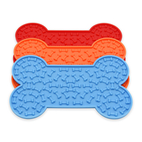 Tapis de léchage en silicone de qualité alimentaire à bords surélevés pour l'alimentation lente et l'entraînement des chiens, en forme d'os