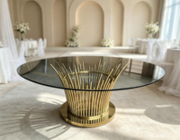 Table de banquet de luxe en verre rond avec base verticale en acier inoxydable doré pour location événementielle
