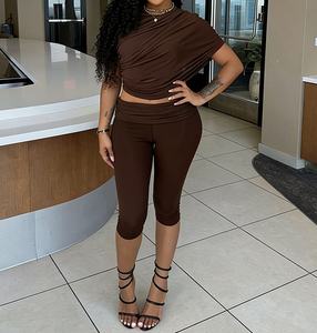 Viviblook J26ST024 Ensemble deux pièces pour femme : Gilet d'été en maille à manches irrégulières et plissées, et pantalon court taille haute - Product Image 1