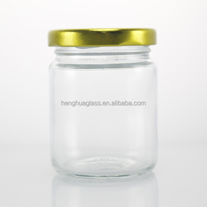Tarro de vidrio redondo transparente de 100ml de grado alimenticio <span class=keywords><strong>para</strong></span> mermelada, miel, pepinillo, <span class=keywords><strong>Nido</strong></span> de Pájaro, almacenamiento de alimentos con tapa de Metal - Product Image 1