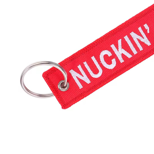 Etiqueta de Llavero de Tela Bordada Roja Personalizada de Fábrica con Texto NUCKIN FUTS para Actividades Diarias - Product Image 6