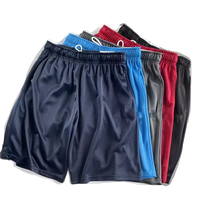 Shorts de basket-ball en maille polyester personnalisés avec logo brodé pour hommes, avec poches latérales zippées