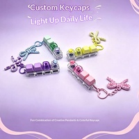 Breloque de clavier mécanique anti-stress en plastique multicolore style coréen, motif macaron, à pression, pour le bout des doigts, avec fonction de décompression