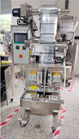 Machine d'emballage de sachets Dates Remplissage et pesage Machine d'emballage de bonbons glacés 1kg Stand up Zipper Snacks Doypack Machine d'emballage