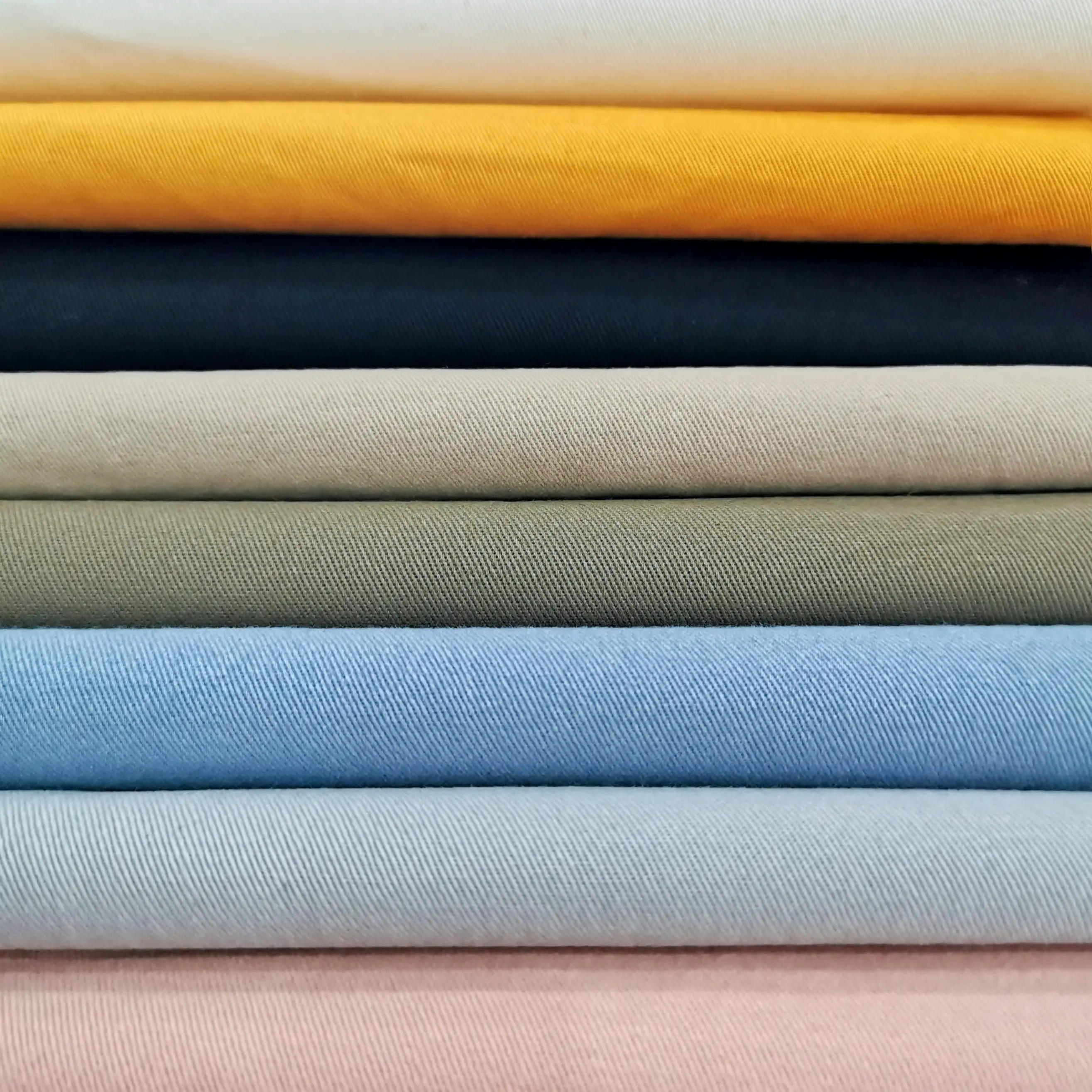 Tela de lona teñida para ropa, tejido de sarga de algodón 100% de color puro orgánico, venta al por mayor