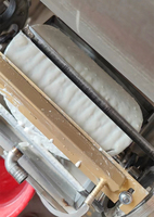 Machine automatique à rouleaux d'œufs à chauffage au gaz Machine à emballer Lumpia pour rouleaux de printemps pour pâtisserie