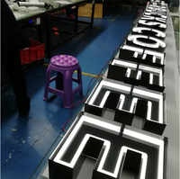 Enseignes lumineuses en acier inoxydable pour le bâtiment de siège de YIJIAO, lettres en relief LED pour l'architecture