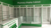 Mobilier d'intérieur pour pharmacie tout-en-un avec comptoir de caisse, taille personnalisée OEM/ODM, éclairage LED vert, respectueux de l'environnement