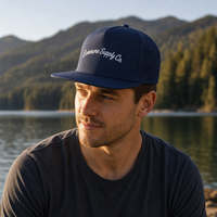Casquette de baseball personnalisée avec logo découpé au laser, perforée, performance, bleu marine, visière plate, 7 panneaux, snapback, vente en gros OEM ODM