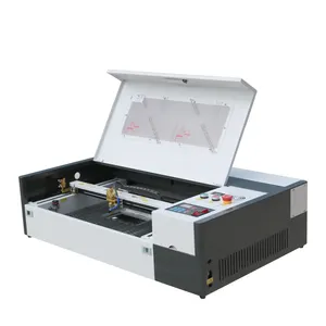 Hochwertige tragbare Mini 3D CNC 3050 Desktop-CO2-Laser-Schneide-Gravurmaschine Holz Heimgebrauch Restaurants DXF-Format