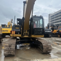 Excavatrice CAT 323D2L d'occasion à faible nombre d'heures de fonctionnement, équipement de construction lourd sur chenilles, jaune, bien entretenue