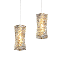 Lustre rectangulaire de luxe nordique en cristal K9 avec corps en acier inoxydable pour chambres d'hôtel, salles à manger, salons et petits halls d'entrée
