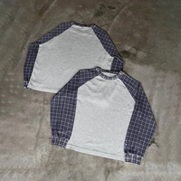 T-shirt Streetwear personnalisé en coton oversize à blocs de couleurs camouflage, T-shirt à manches longues gaufrées pour homme