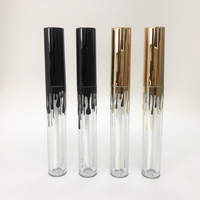 Boîte personnalisée logo 4ml tube de brillant à lèvres rond en plastique or noir, récipient transparent pour brillant à lèvres avec capuchon noir doré