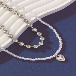 Collier en perles d'imitation en forme de cœur, double couche, chaîne de clavicule, bijoux de mode pour femmes, style cadeau - Product Image 1