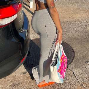 Nouvel article 2024 élégant décontracté taille <span class=keywords><strong>haute</strong></span> poche froncé couleur unie mince Sexy <span class=keywords><strong>jupe</strong></span> longue - Product Image 3