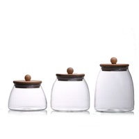 Driehoekige theebus van helder borosilicaatglas met bamboe deksel met bolvormige knop voor geurende thee, granen, voedselveilige container