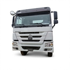 Used SINOTRUCK HOWO 371 Tractor Truck 6X4 Diesel Manual Transmission 371HP Euro 3 Left Steering Truck Head Logistics Transport - Product Image 1