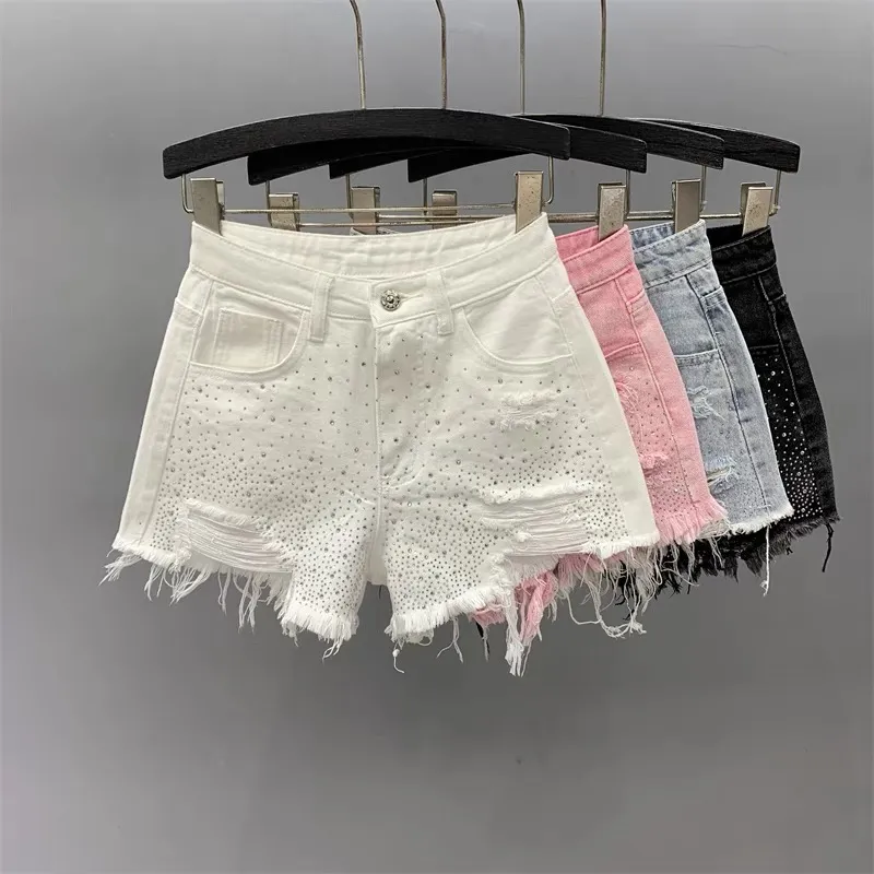 Heavy iron drill denim shorts women 2024 summer new high-waisted slimming Spice Girl ripped holes rough edge wide leg hot pants