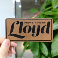 Fournisseur de patchs en cuir véritable, logo de marque personnalisé, patch en cuir thermocollant avec support thermocollant