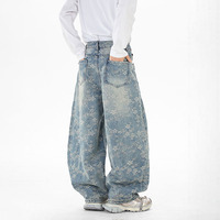 Pantalon ample à jambes larges, pantalon tendance à coupe incurvée, pantalon en jean jacquard tendance à motifs végétaux et floraux