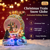 Lanterne musicale de Noël en gros, lanterne à eau LED animée, globe à neige avec train de Noël, décoration de vacances pour la maison et l'intérieur