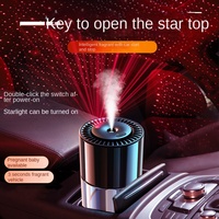 Nouveau diffuseur d'aromathérapie haut de gamme en alliage métallique pour grille d'aération de voiture, design ciel étoilé, porte-gobelet intelligent, parfum longue durée