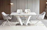 Table à manger rectangulaire moderne de style nordique minimaliste avec cadre en acier inoxydable blanc, plateau en marbre, hauteur réglable pour la maison et l'hôtel